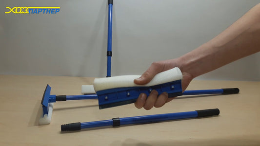 A glass sweeper with a metal stick 2 in 1 length 78 cm