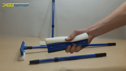 A glass sweeper with a metal stick 2 in 1 length 78 cm